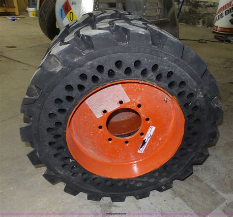 skid steer tires rims|solid bobcat tires and rims.